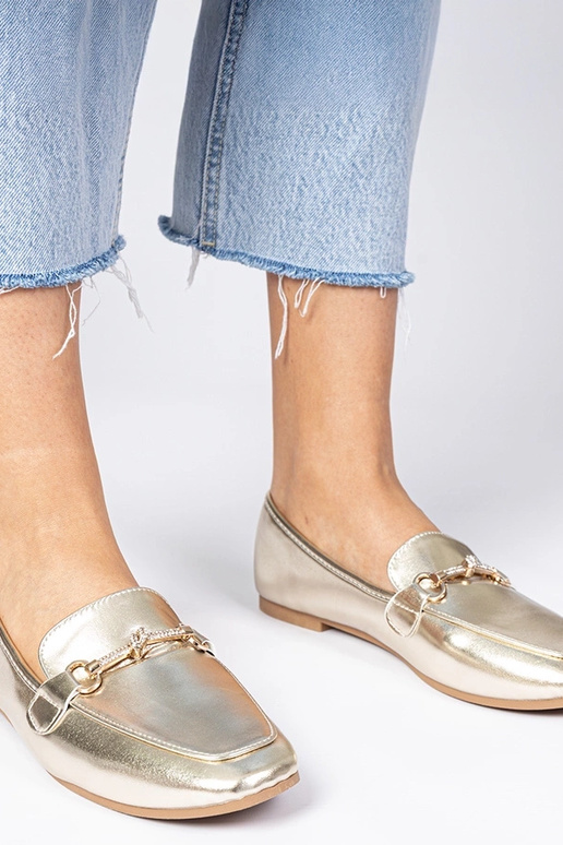 Mocasines dorados con adorno y... Mocasines dorados con adorno y...