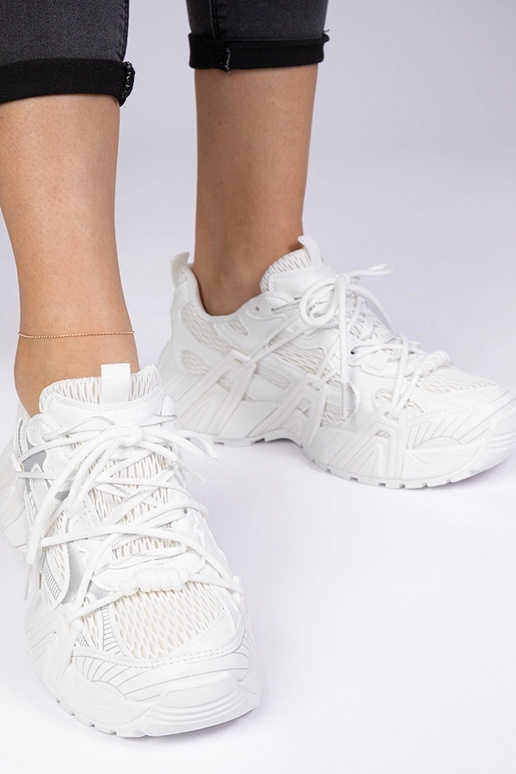 Zapatillas blancas estilosas de suela...