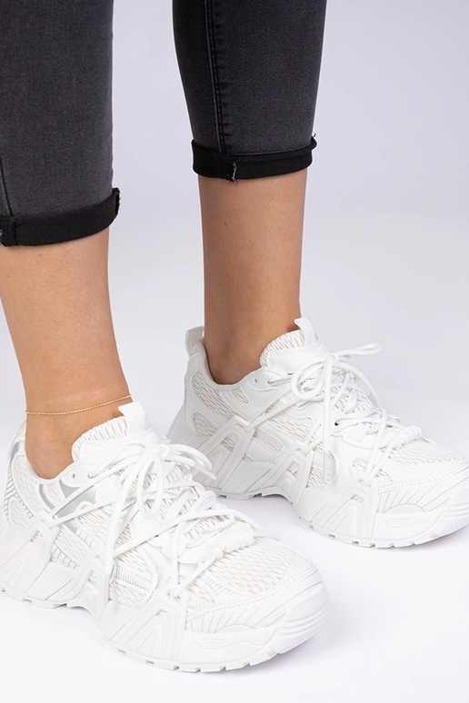 Zapatillas blancas estilosas de suela...