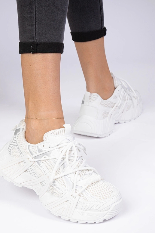 Zapatillas blancas estilosas de suela...