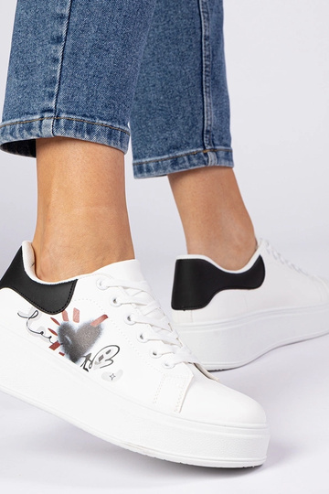 Zapatillas blanco negras... 2