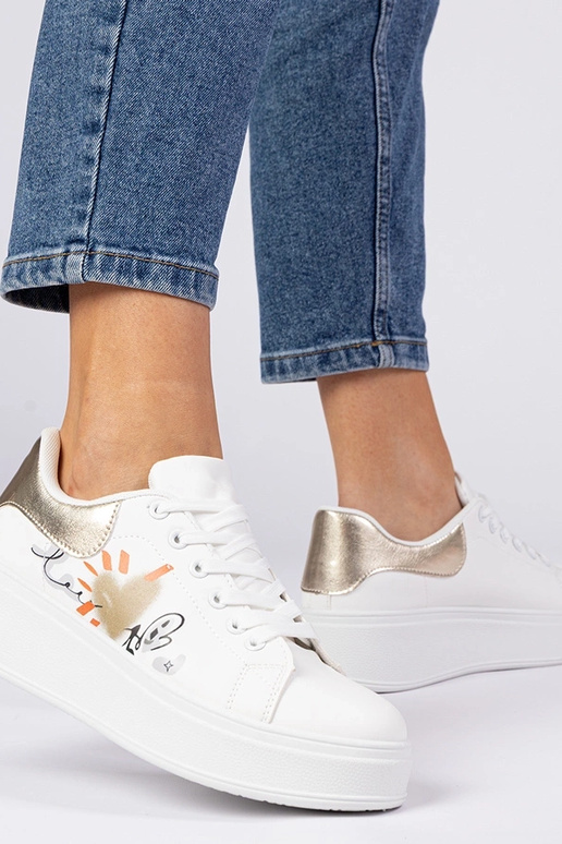 Zapatillas blanco doradas deportivas...