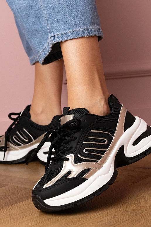 Zapatillas deportivas negras de... Zapatillas deportivas negras de...