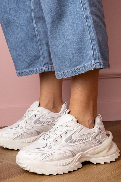 Zapatillas deportivas blancas de... Zapatillas deportivas blancas de...