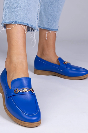 Mocasines azules con adorno...