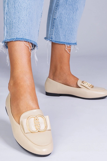 Mocasines de color beige...