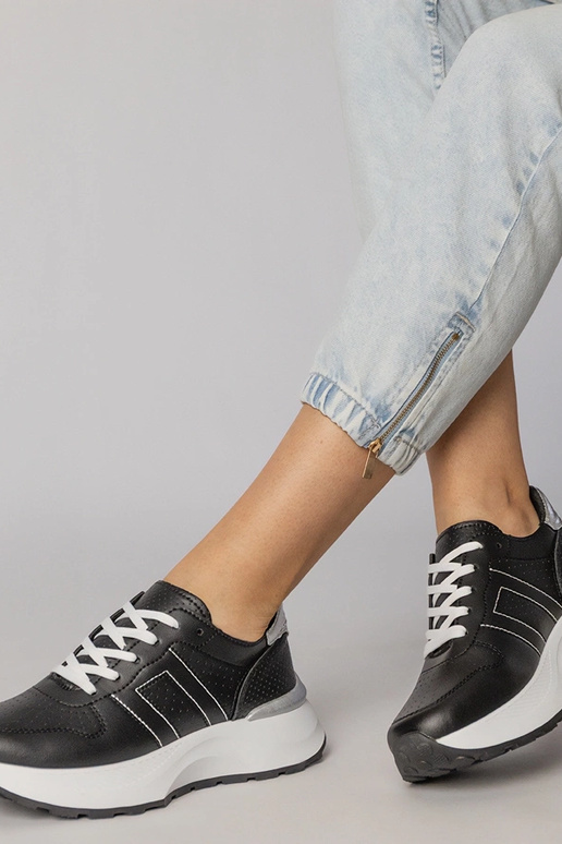 Zapatillas deportivas negras con... Zapatillas deportivas negras con...