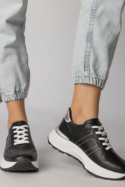 Zapatillas deportivas negras con... Zapatillas deportivas negras con...