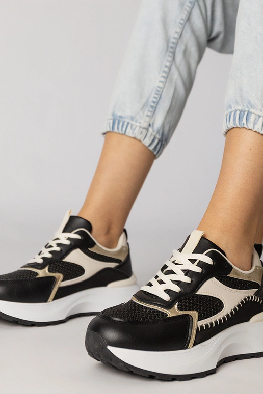 Zapatillas deportivas negras con... Zapatillas deportivas negras con...