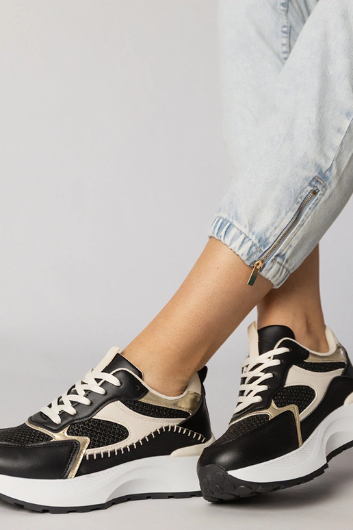 Zapatillas deportivas negras con... Zapatillas deportivas negras con...