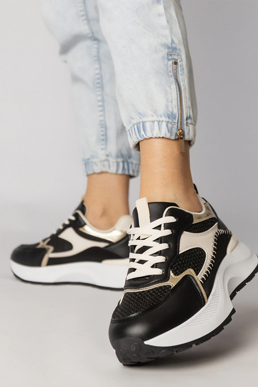 Zapatillas deportivas negras con... Zapatillas deportivas negras con...