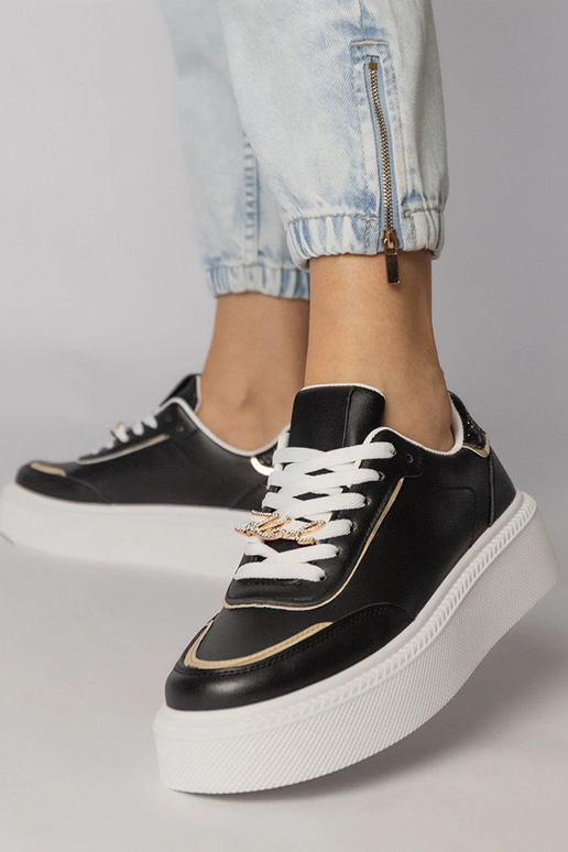 Zapatillas deportivas negras con... Zapatillas deportivas negras con...