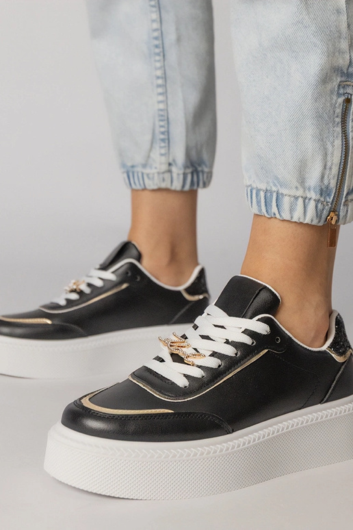 Zapatillas deportivas negras con... Zapatillas deportivas negras con...