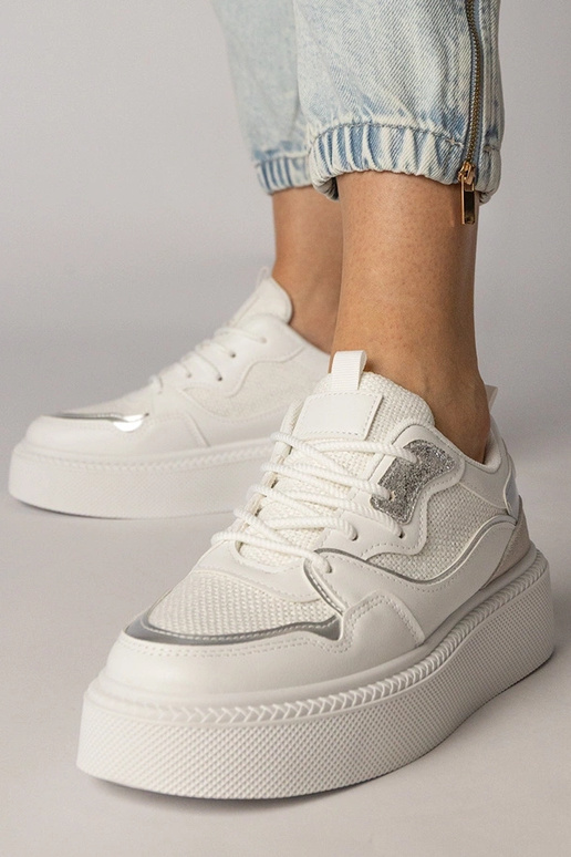 Zapatillas deportivas blancas con... Zapatillas deportivas blancas con...