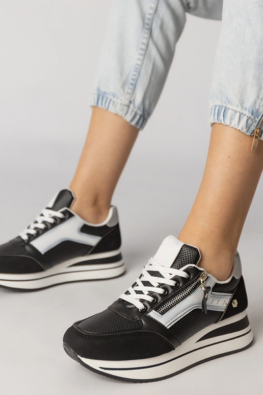 Zapatillas deportivas negras con... Zapatillas deportivas negras con...