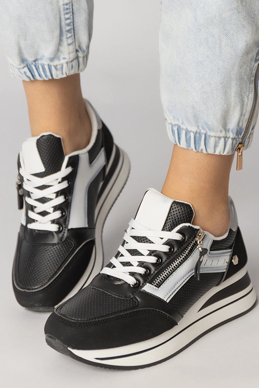 Zapatillas deportivas negras con... Zapatillas deportivas negras con...