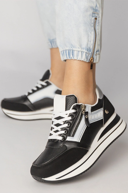 Zapatillas deportivas negras con... Zapatillas deportivas negras con...