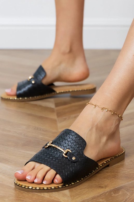 Pantuflas planas negras con cinta...