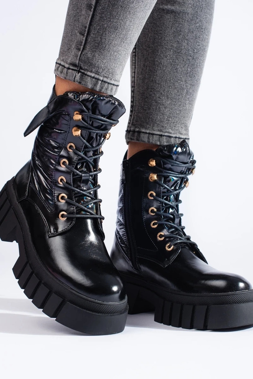 Botas de mujer con suela gruesa en... Botas de mujer con suela gruesa en...