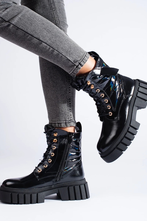 Botas de mujer con suela gruesa en... Botas de mujer con suela gruesa en...