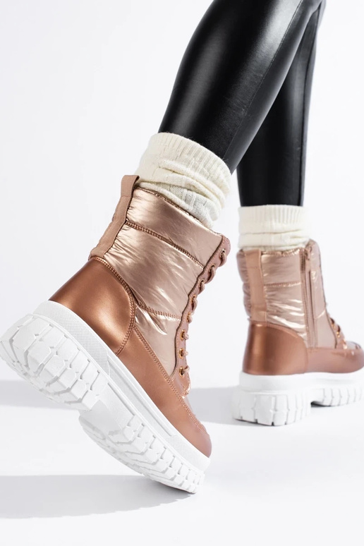 Botas de nieve de mujer color dorado... Botas de nieve de mujer color dorado...