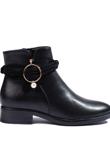 Botas planas de mujer en...