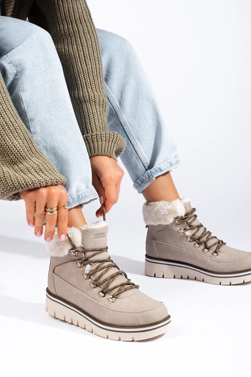 Botas de mujer con plataforma en... Botas de mujer con plataforma en...