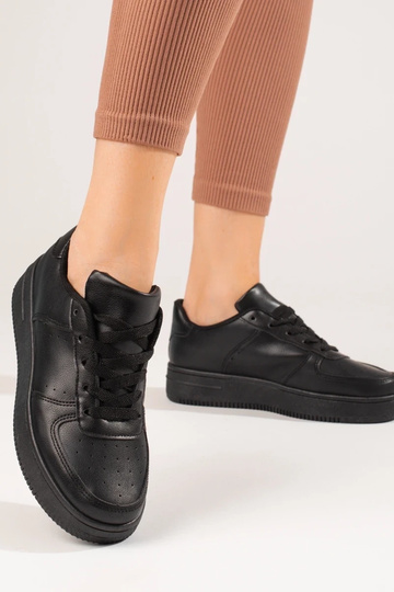 zapatos deportivos negros... 2