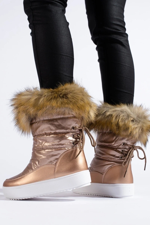 Botas de nieve de mujer rosas con pelo. Botas de nieve de mujer rosas con pelo.