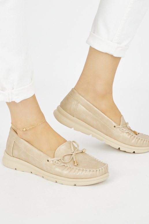 Mocasines cómodos de color dorado...