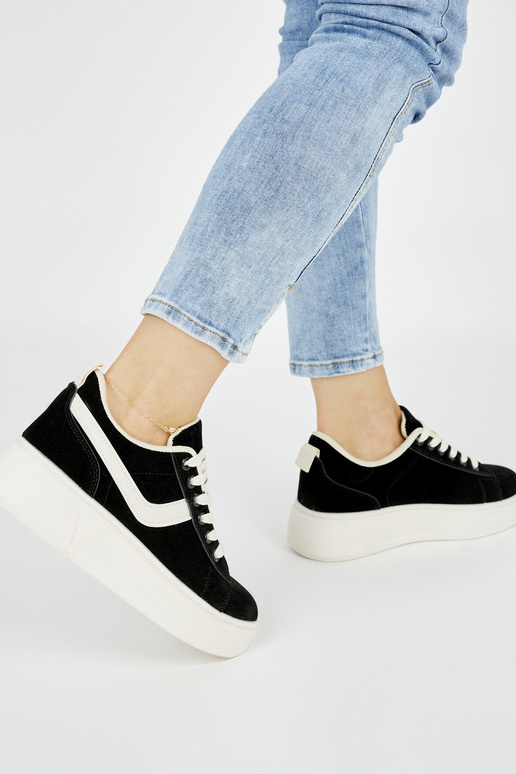 zapatos de plataforma de ante negro...