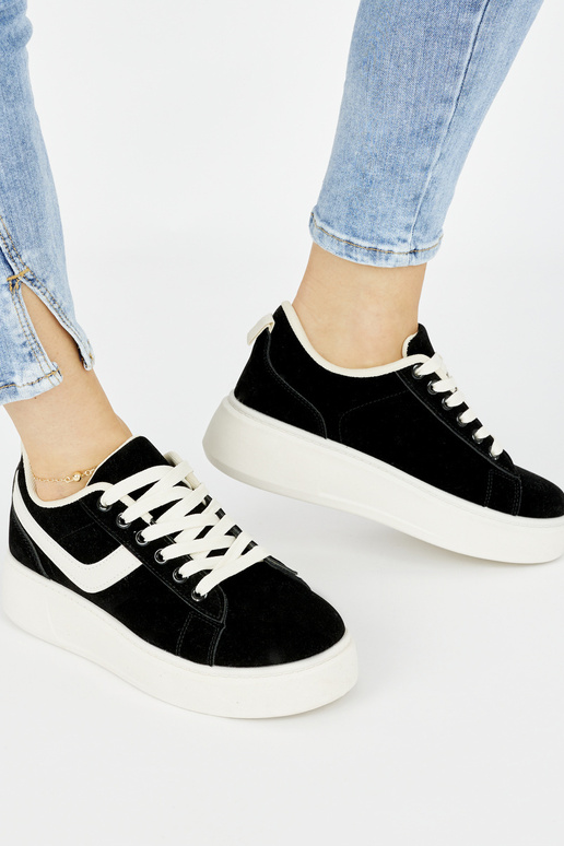 zapatos de plataforma de ante negro...