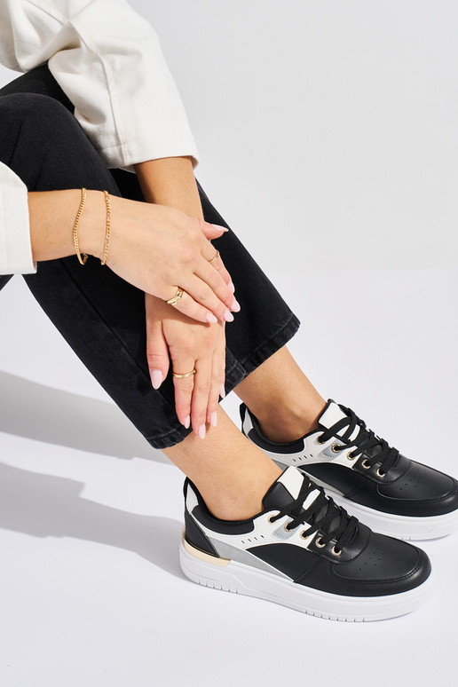 zapatillas deportivas negras con...