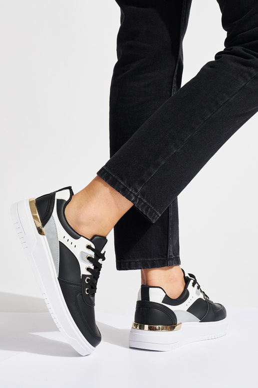 zapatillas deportivas negras con...