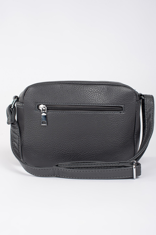 Pequeño gris bolso elegante sobre el...