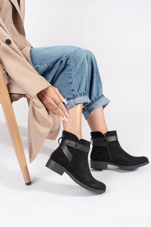 Botas de mujer de ante negro con raya... Botas de mujer de ante negro con raya...