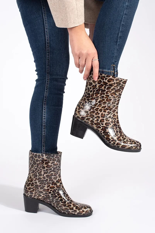 Botas de goma mujer en tacones altos...