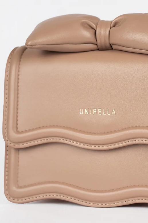 Pequeño beige bolso elegante con un arco