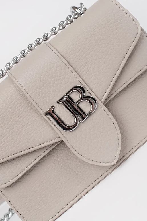 Bolso pequeño color marfil para mujer...