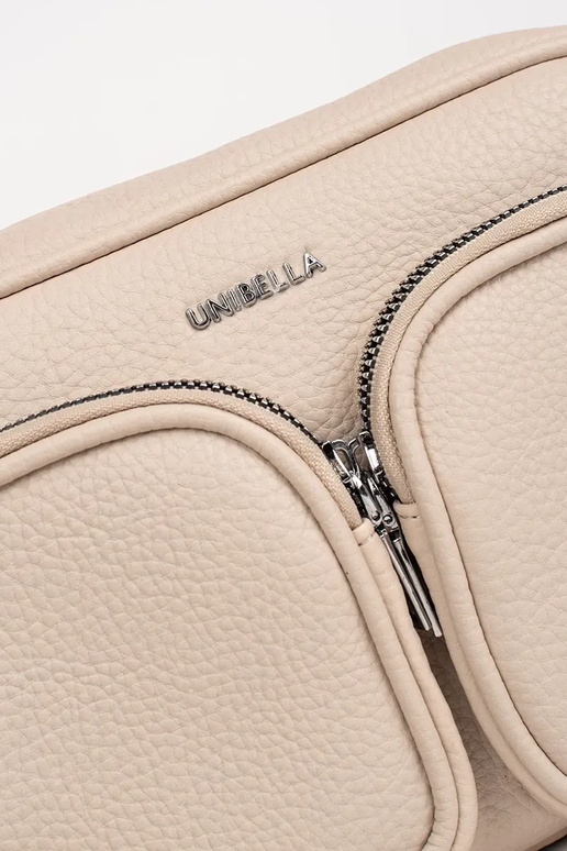 Bolso pequeño color marfil con bolsillos