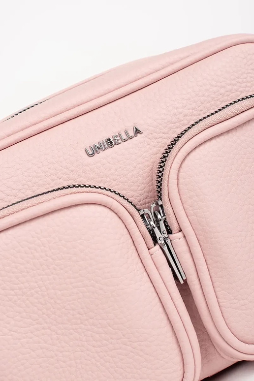 Bolso pequeño color rosa con bolsillos