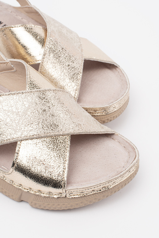 Sandalias planas doradas de mujer Sandalias planas doradas de mujer