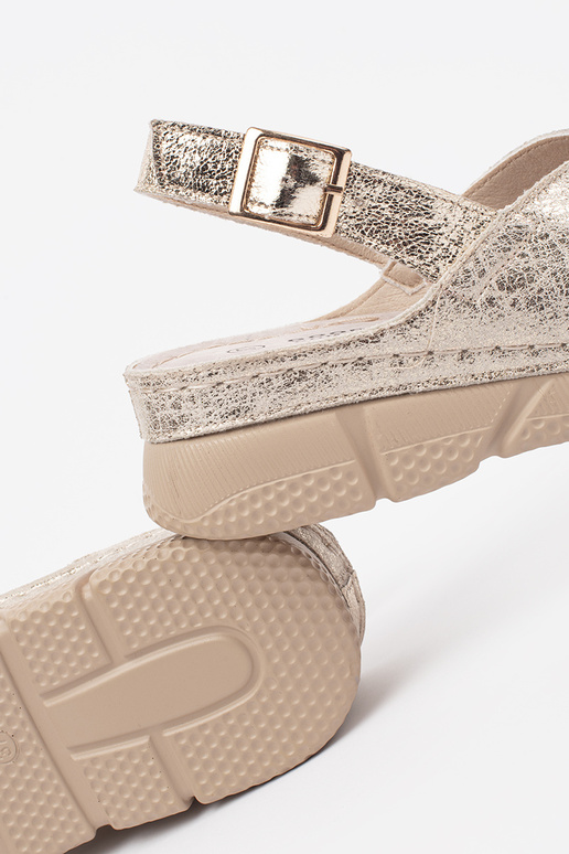 Sandalias planas doradas de mujer Sandalias planas doradas de mujer