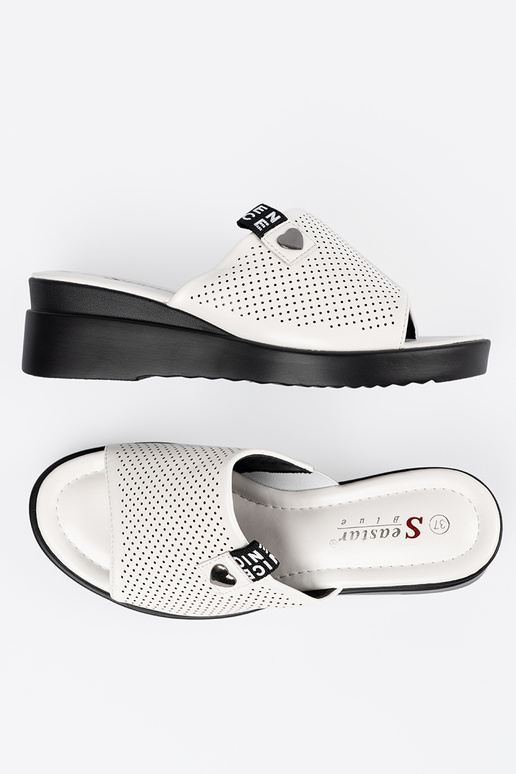 Zapatillas perforadas con plataforma... Zapatillas perforadas con plataforma...