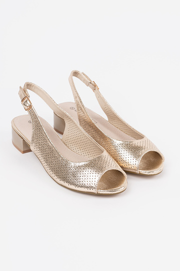 Sandalias doradas de mujer... 2