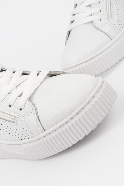 Zapatillas blancas de modelo con... Zapatillas blancas de modelo con...