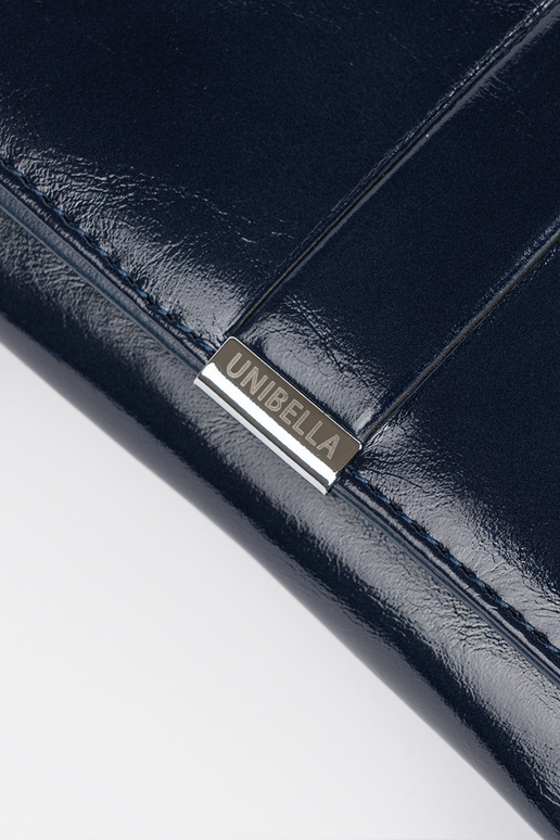 Cartera azul marino de mujer de piel...