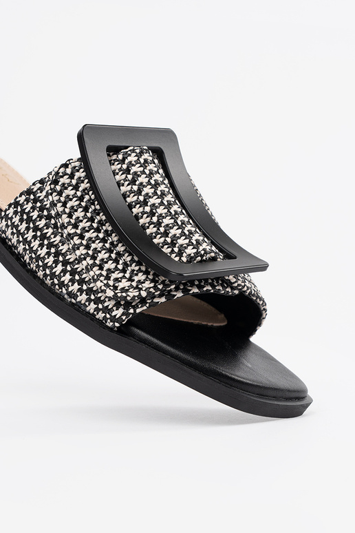 Chanclas planas blanco y negro