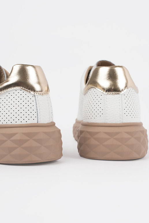 Zapatillas de mujer de cuero blancas... Zapatillas de mujer de cuero blancas...