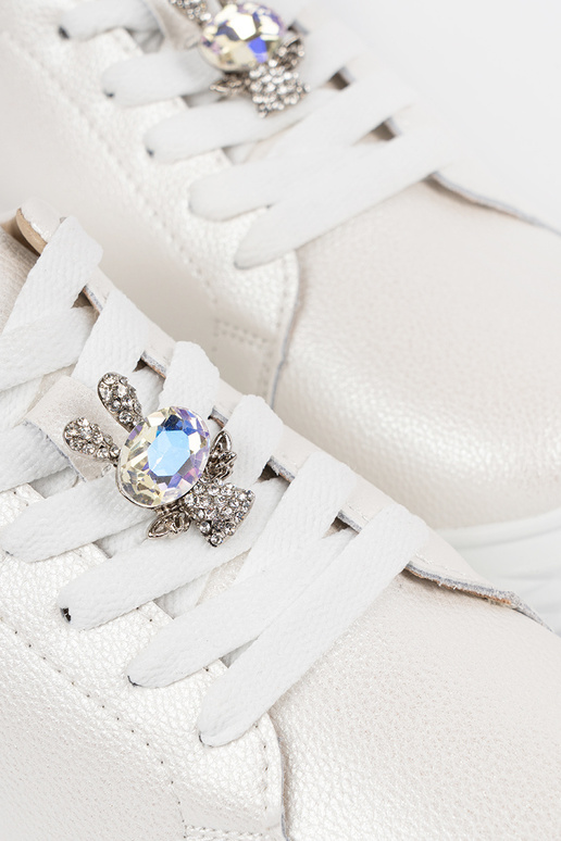 Zapatos deportivos de cuero blanco y... Zapatos deportivos de cuero blanco y...